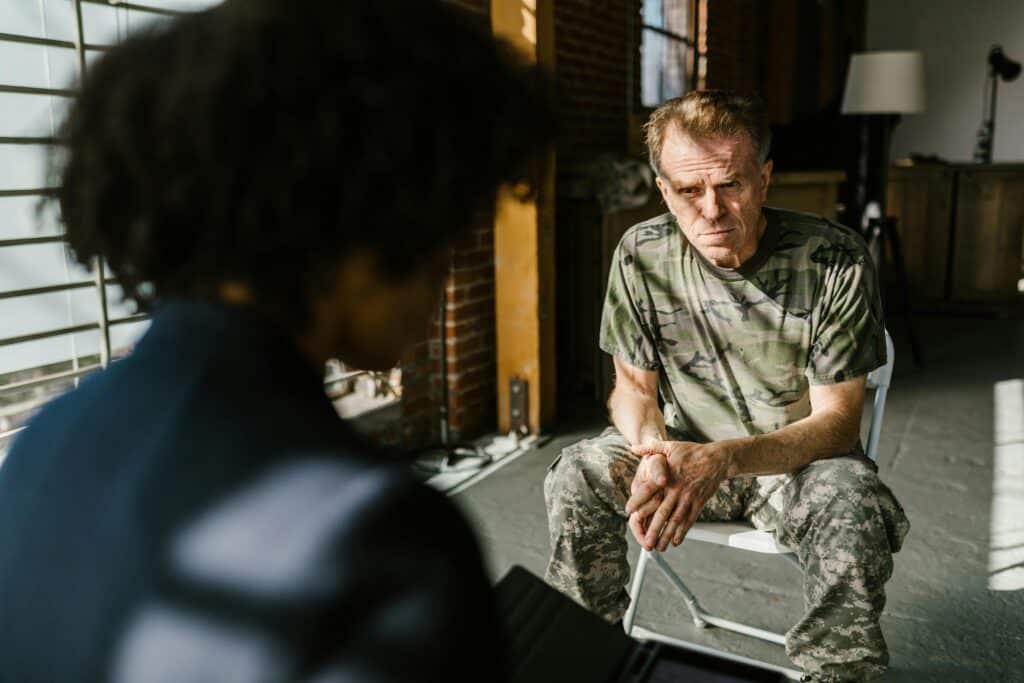 Veteran discussing car accident claim with attorney
