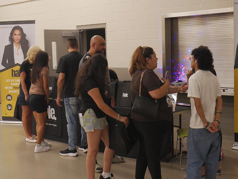 Hale Injury Law’s booth at the Monday Night Fever adoptions event welcomed attendees with swag bags and information, helping support the adoption of 41 pets into forever homes.