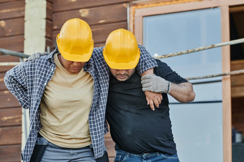 Injured worker holding their arm at a job site, symbolizing Nevada workers’ compensation subrogation laws.
