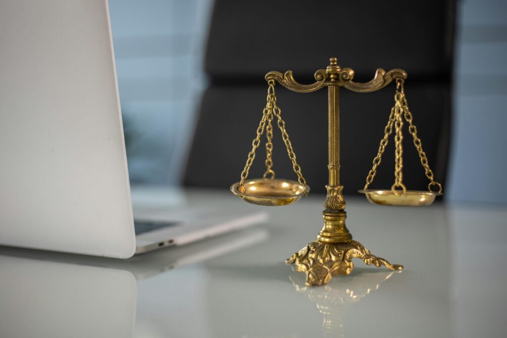 Justice scales on a lawyer’s desk representing balance and fairness in personal injury law