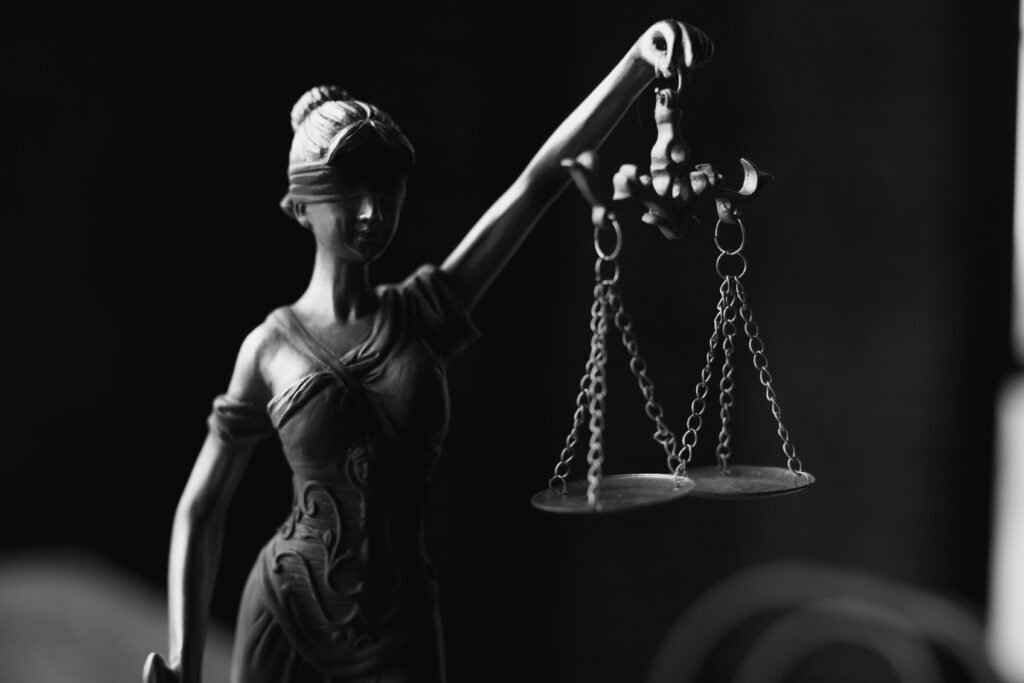 Lady Justice holding balanced scales representing fairness in Nevada’s statute of limitations for personal injury claims.