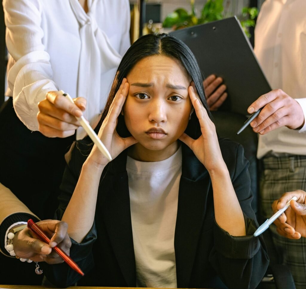 Person appearing pressured during a decision related to an Arizona personal injury claim, reflecting concerns about rushed legal settlements.