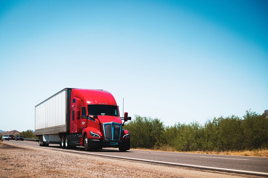 18-wheeler commercial truck traveling on Interstate 15 in Las Vegas, illustrating the need for a truck accident lawyer in Las Vegas after a serious trucking collision.