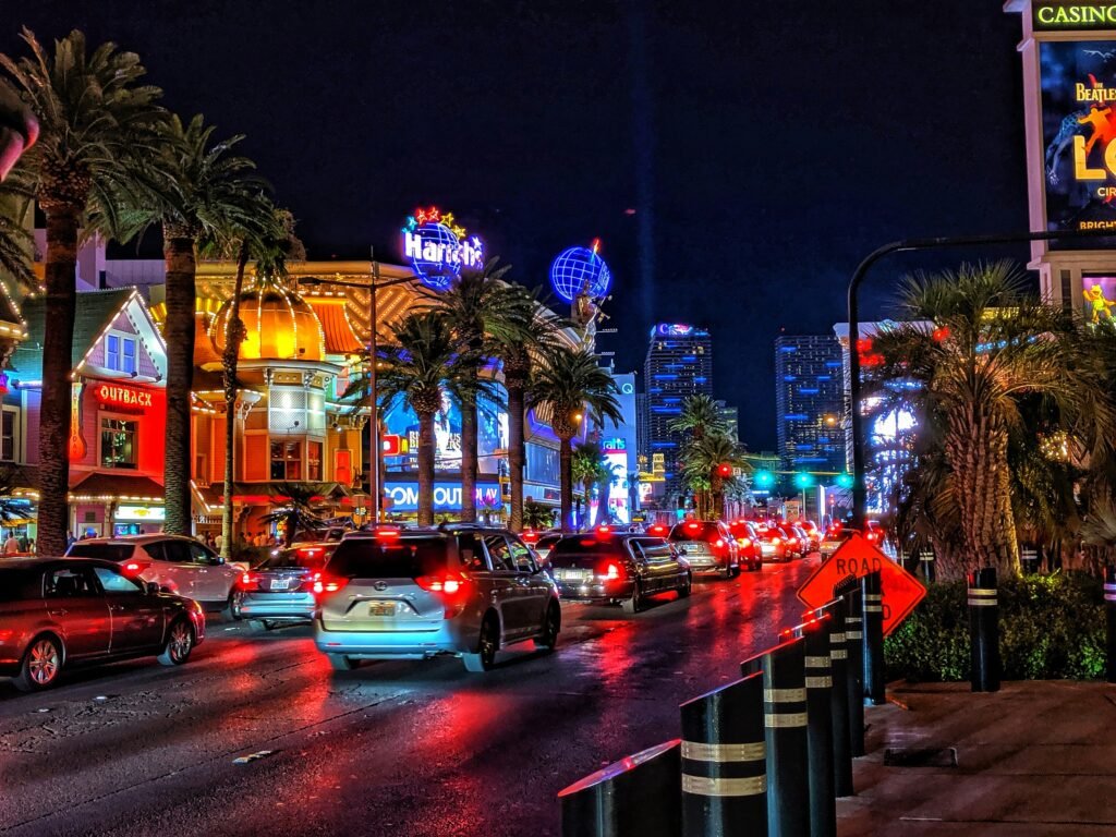 Traffic along the Las Vegas Strip at night, representing what to do after a car accident in Las Vegas.